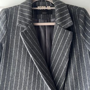 Grey with white stripes coat